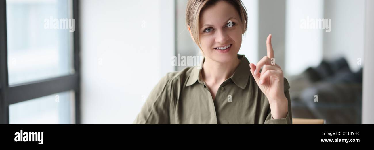 Woman points finger table hi-res stock photography and images - Alamy