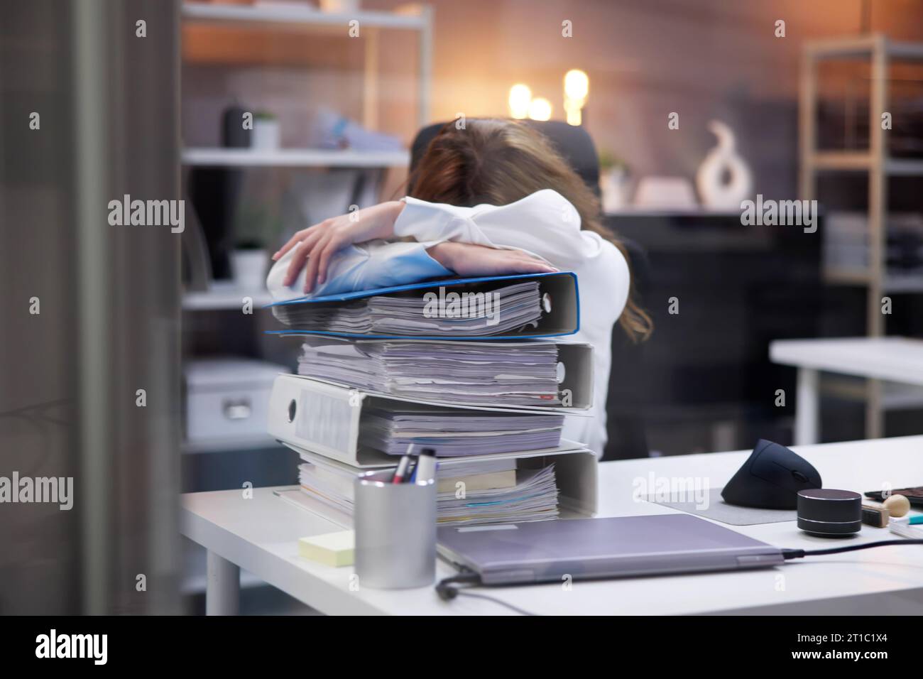 Upset woman using calculator hi-res stock photography and images - Alamy