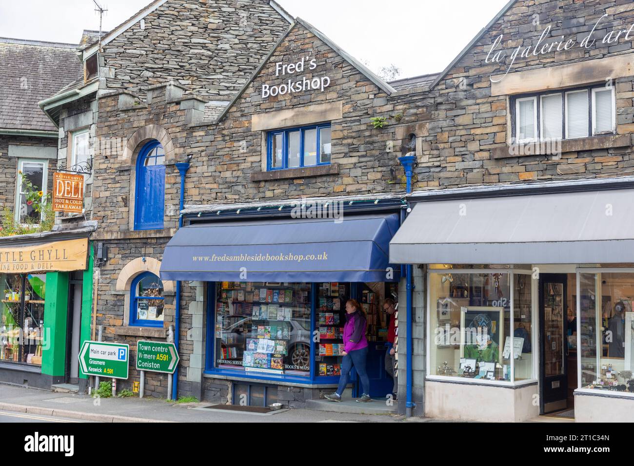 Ambleside town centre shops and retail stores including bookshop,Lake District national park,Cumbria,England,2023 Stock Photo