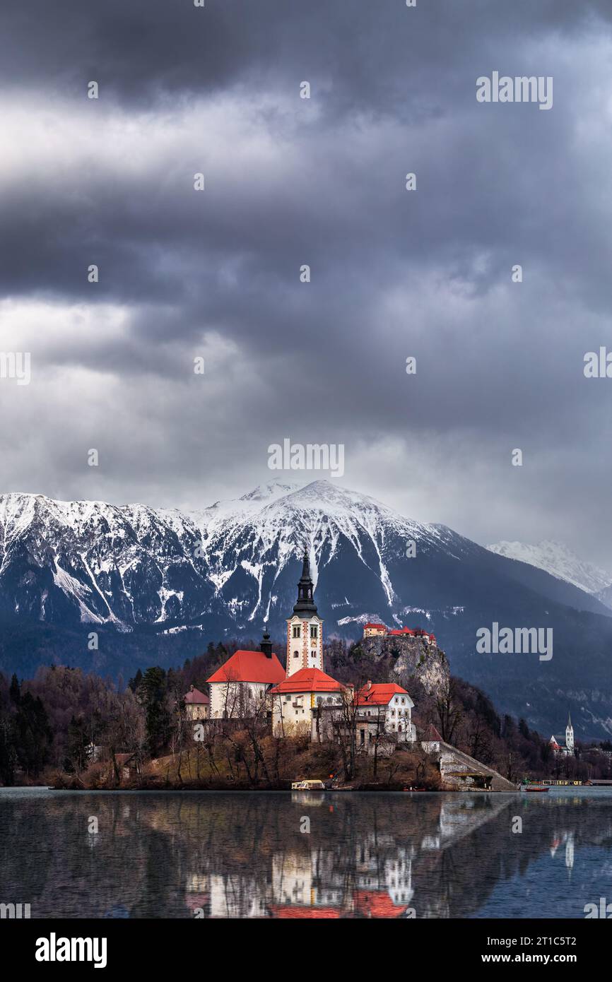Bled, Slovenia - Beautiful view of Lake Bled (Blejsko Jezero) with reflecting Pilgrimage Church of the Assumption of Maria on Bled Island, Bled Castle Stock Photo