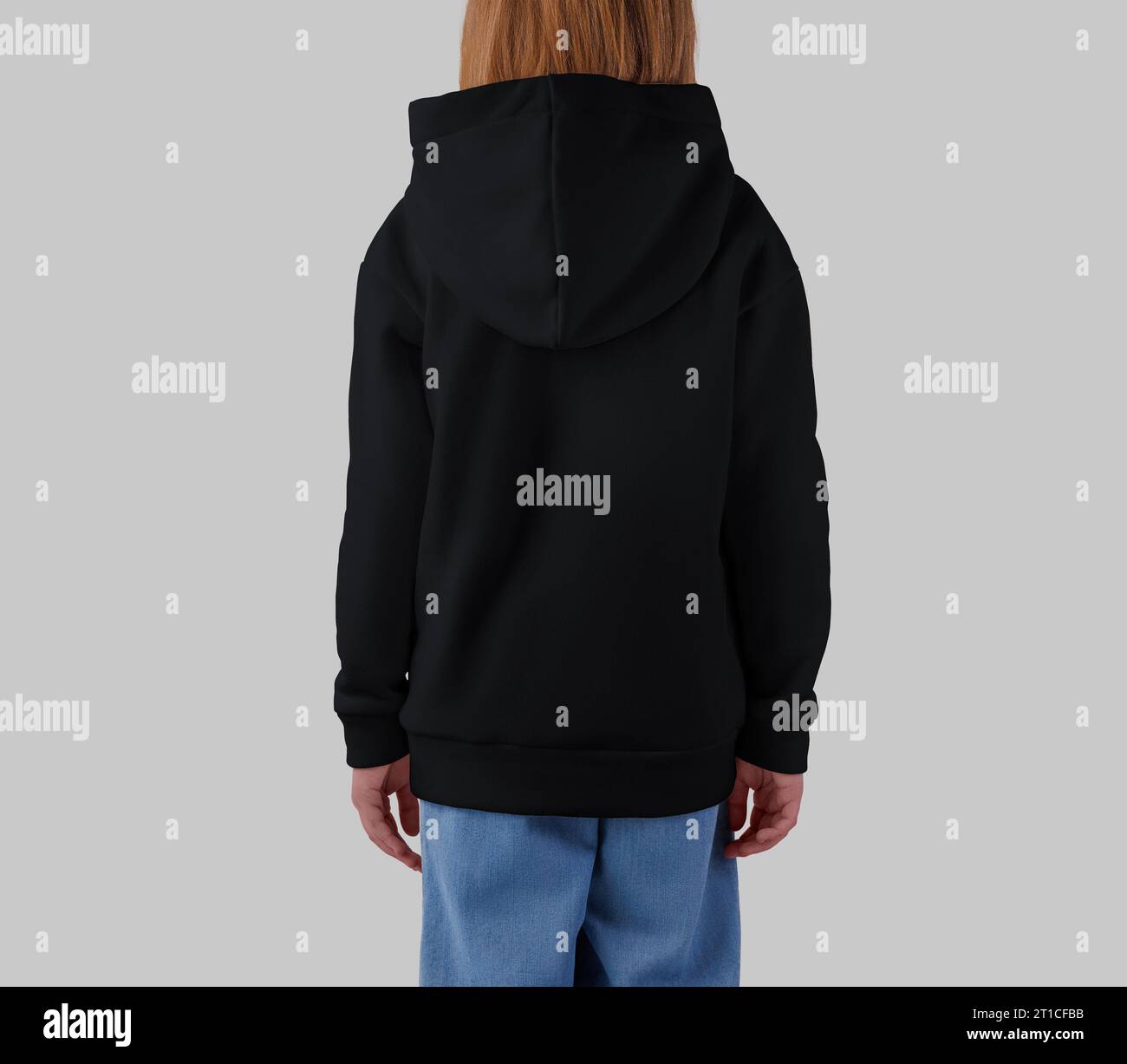 Template of a black hoodie on a blonde girl, back view, shirt for design, print, branding. Mockup of warm kid's clothing, isolated on background. Prod Stock Photo