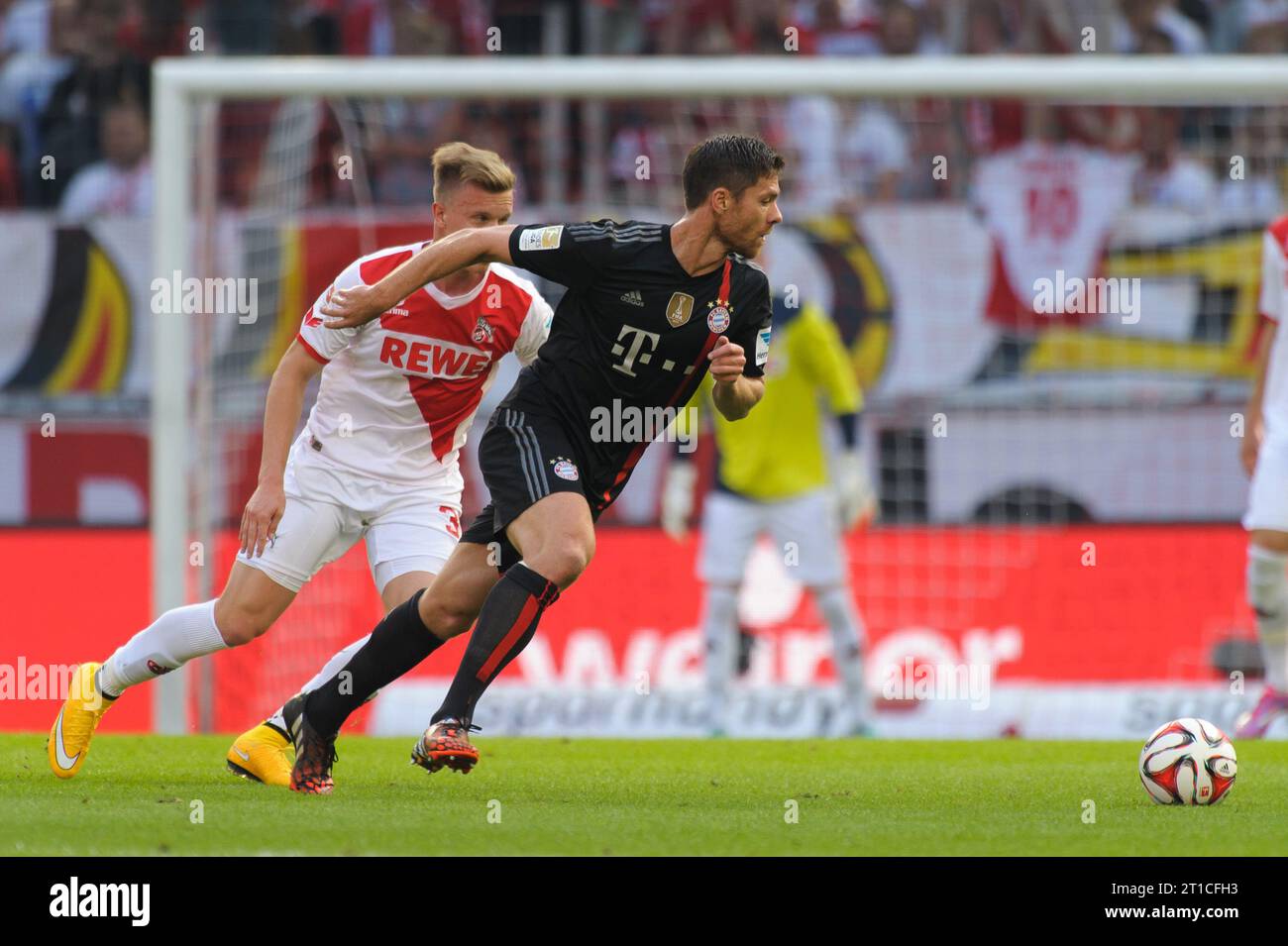 Xabi Alonso (3 - FC Bayern München) 1.FC Koeln - FC Bayern Muenchen 0:2 Fussball Bundesliga Saison 2014/2015 in Koeln, Deutschland am 27.09.2014 Stock Photo