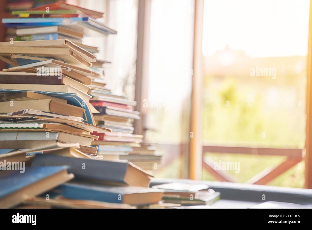 pile of old books on the table Stock Photo - Alamy