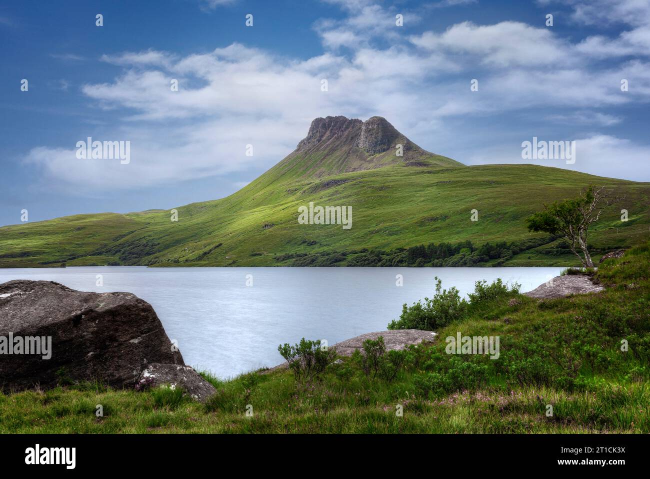 Stac Pollaidh is a distinctive mountain located in the Assynt region of Sutherland, Scotland. Stock Photo