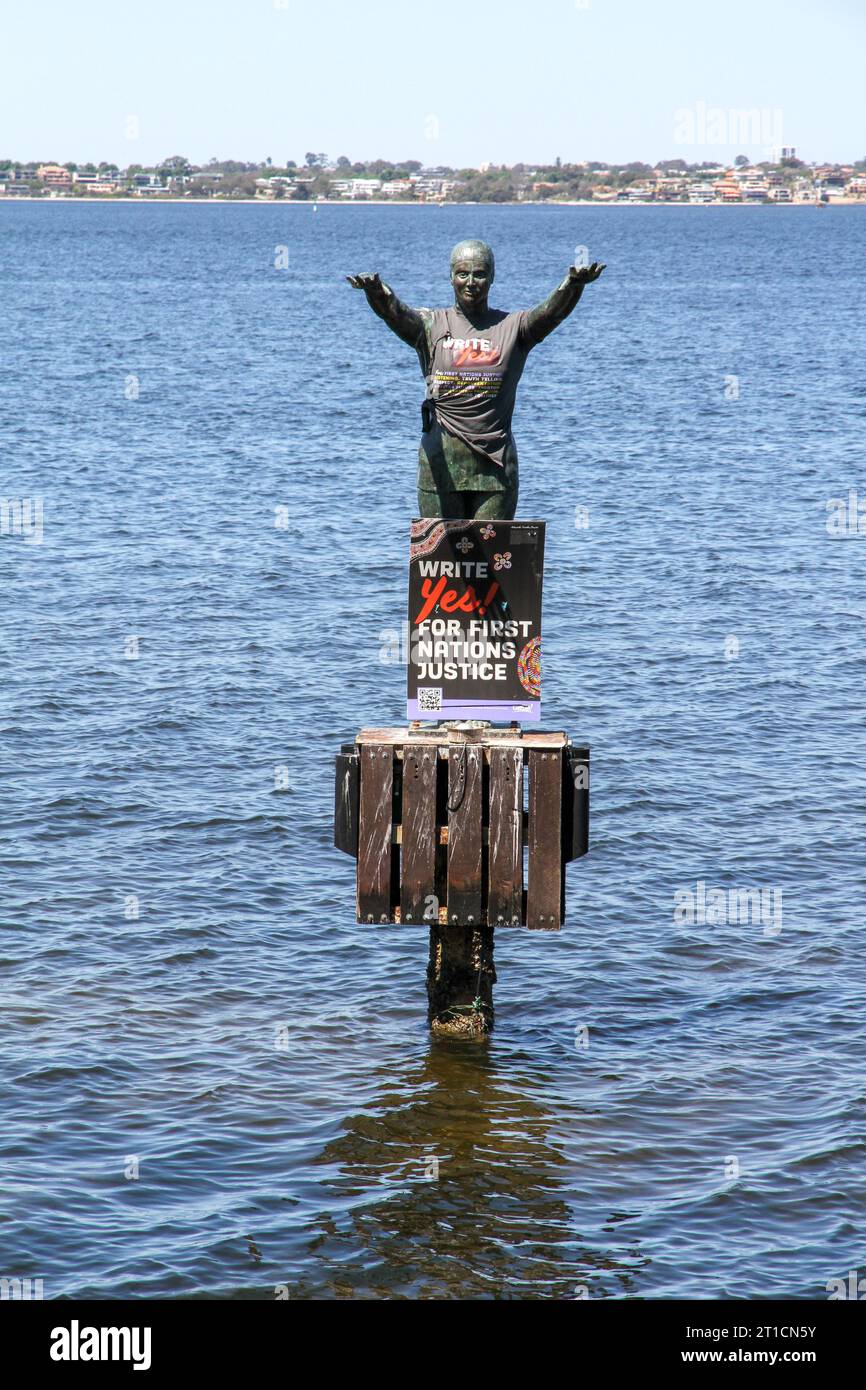 Perth, Australia - October 13, 2023 The Eliza is a bronze sculpture in Perth, Western Australia, has had vote yes poster and t-shirt placed on it ahead of the Aboriginal and Torres Strait Islander Voice referendum. On Saturday, 14 October 2023, Australians will have their say in a referendum about whether to change the Constitution as voters will be asked to vote ‘yes’ or ‘no’ on a single question. The question on the ballot paper will be: “A Proposed Law: to alter the Constitution to recognise the First Peoples of Australia by establishing an Aboriginal and Torres Strait Islander Voice. Do yo Stock Photo