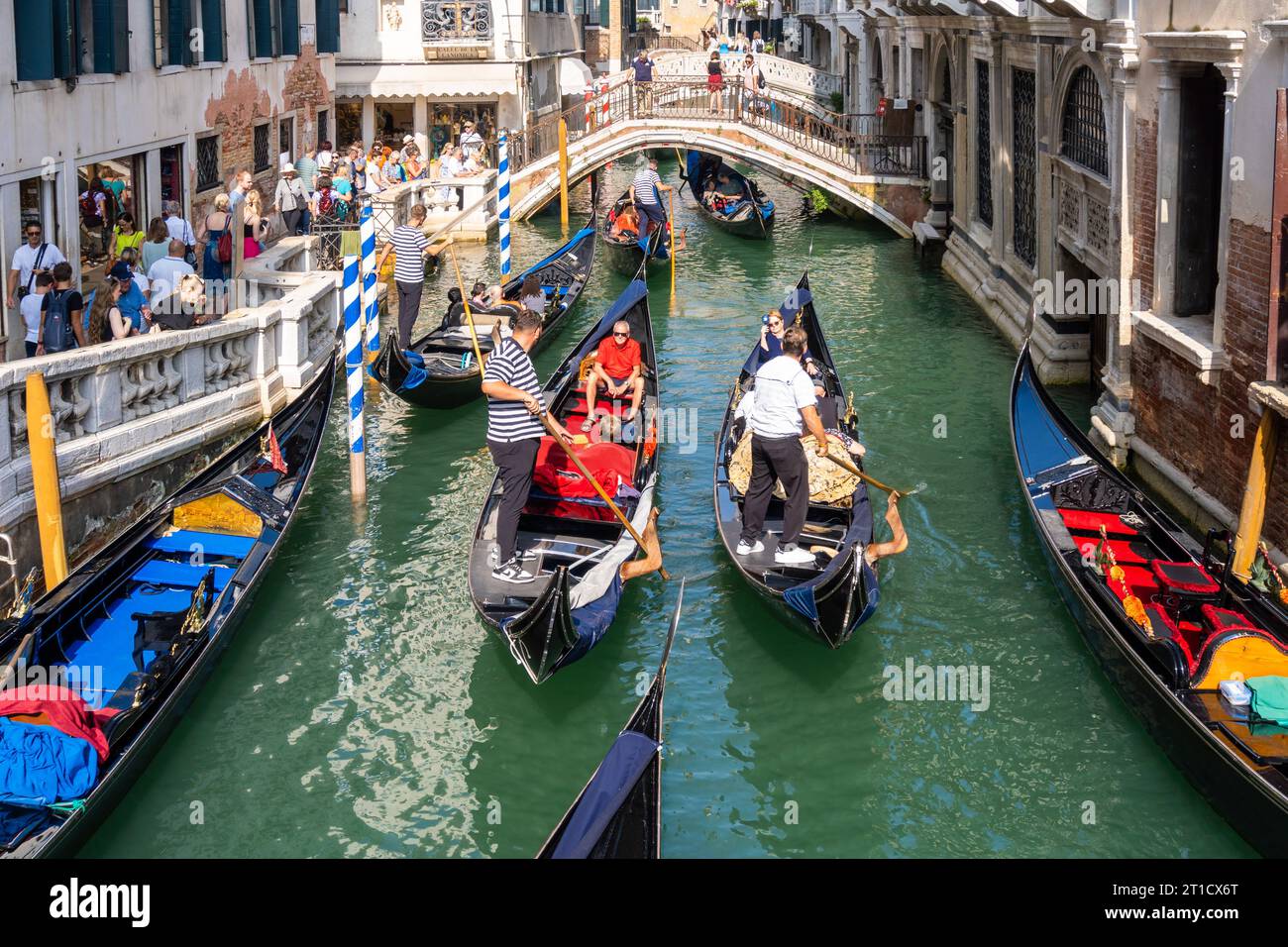 Venice, Italy. 2nd Oct, 2023. A small canal in Venice with tourists and gondolas *** Ein kleiner Kanal in Venedig mit Touristen und Gondeln Credit: Imago/Alamy Live News Stock Photo