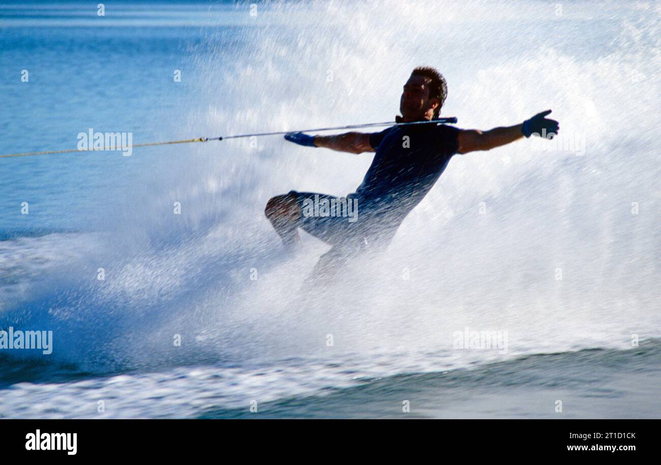 Australia. Queensland. Young man barefoot waterskiing Stock Photo Alamy