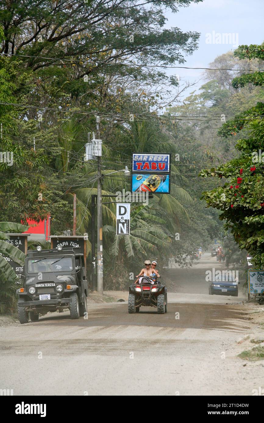 A typical dirt road in Santa Teresa beach, Nicoya peninsula, Costa Rica. Stock Photo