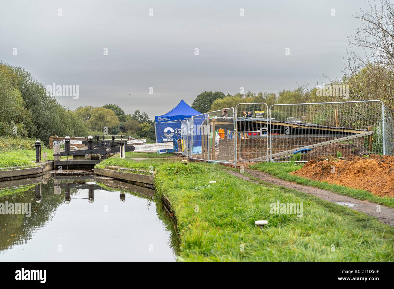 Canal and River Trust working at a lock on a canal repairing a