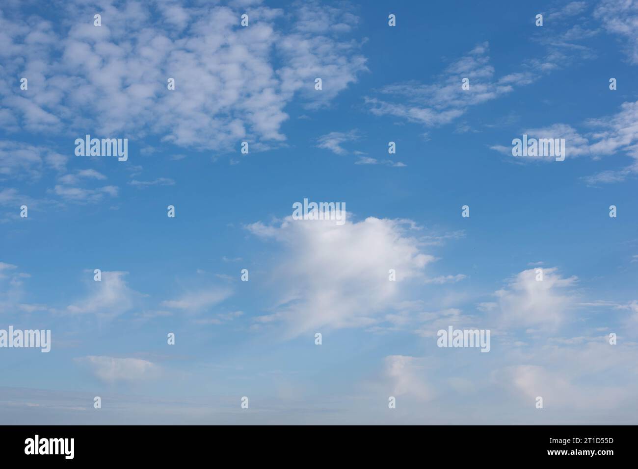 fluffy clouds on the blue sky Stock Photo - Alamy
