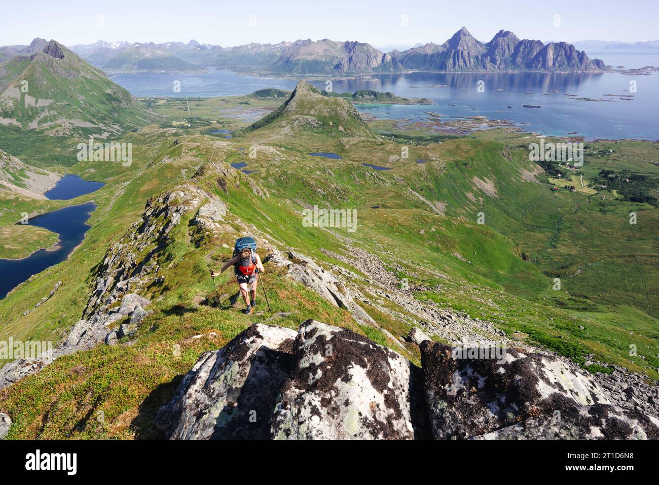 Woman walking uphill mountain hi-res stock photography and images - Alamy