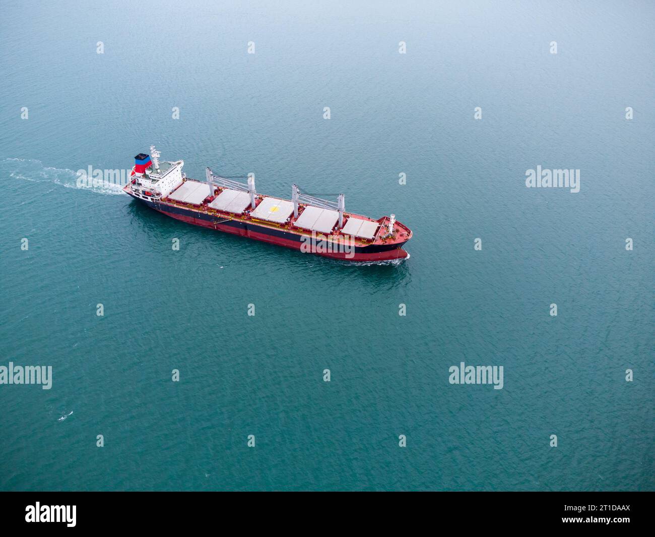 a large bulk carrier transports grain at sea, top view Stock Photo - Alamy