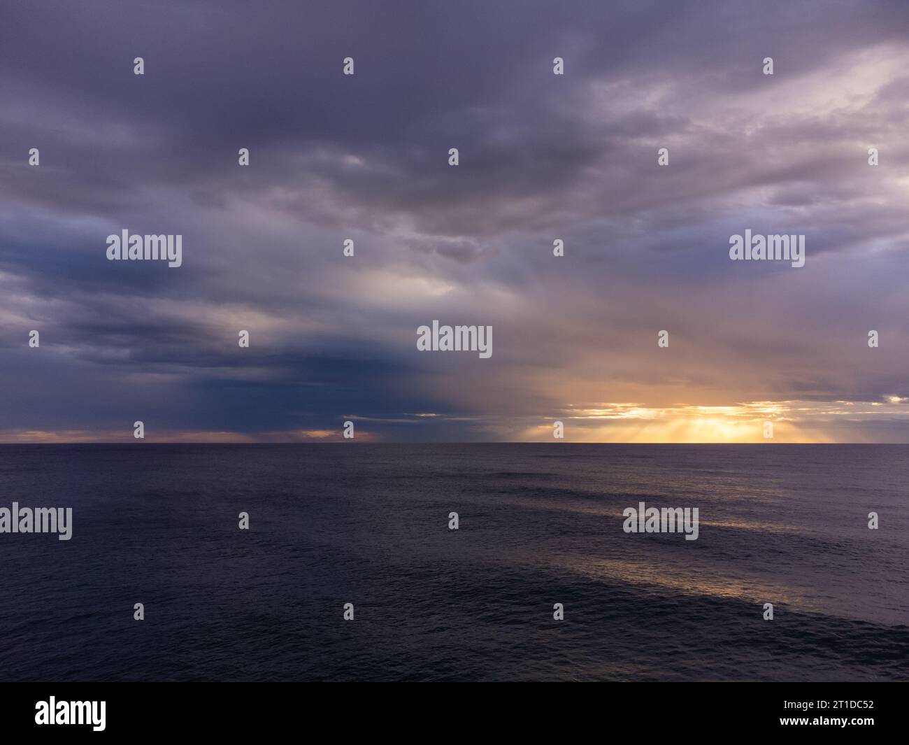 Aerial view from a flying drone of sunrise or sunset over ocean Stock ...