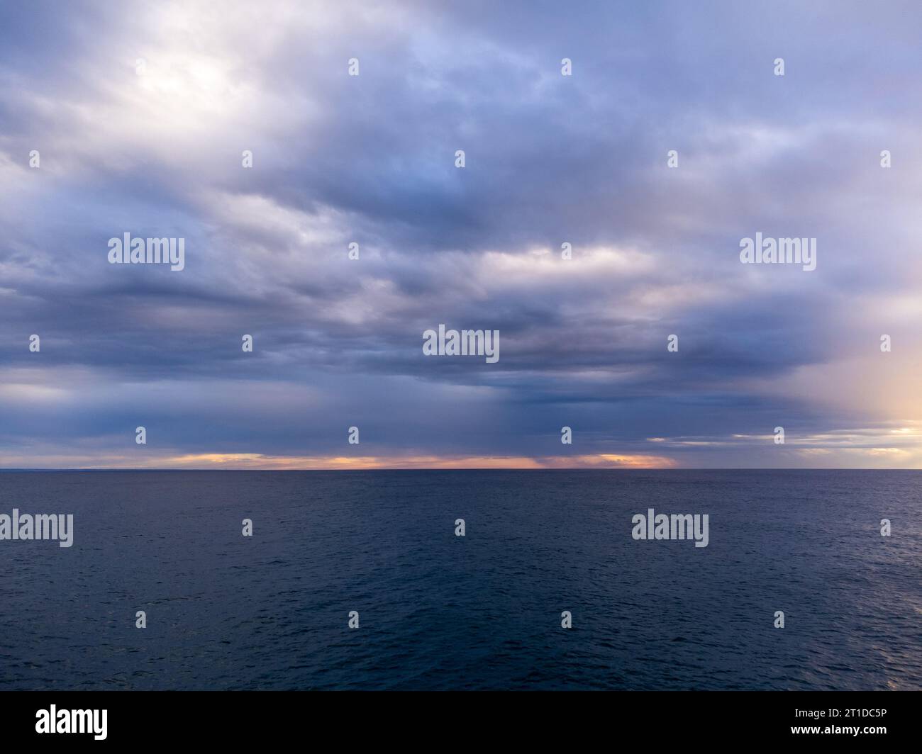 Aerial view from a flying drone of sunrise or sunset over ocean Stock ...