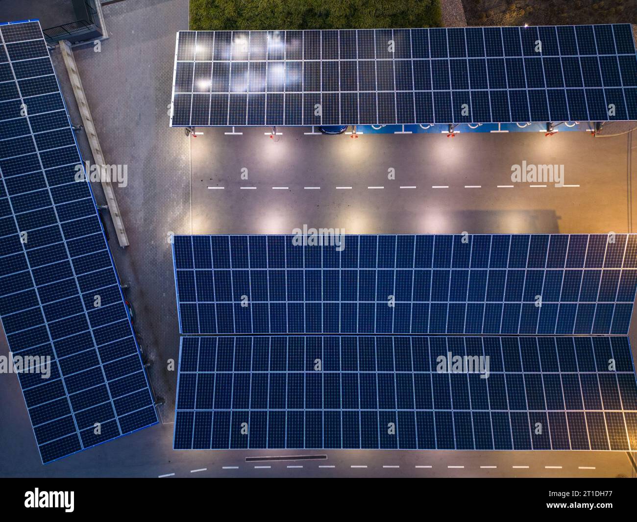 Solar panel installed in parking lot aerial evening view Stock Photo