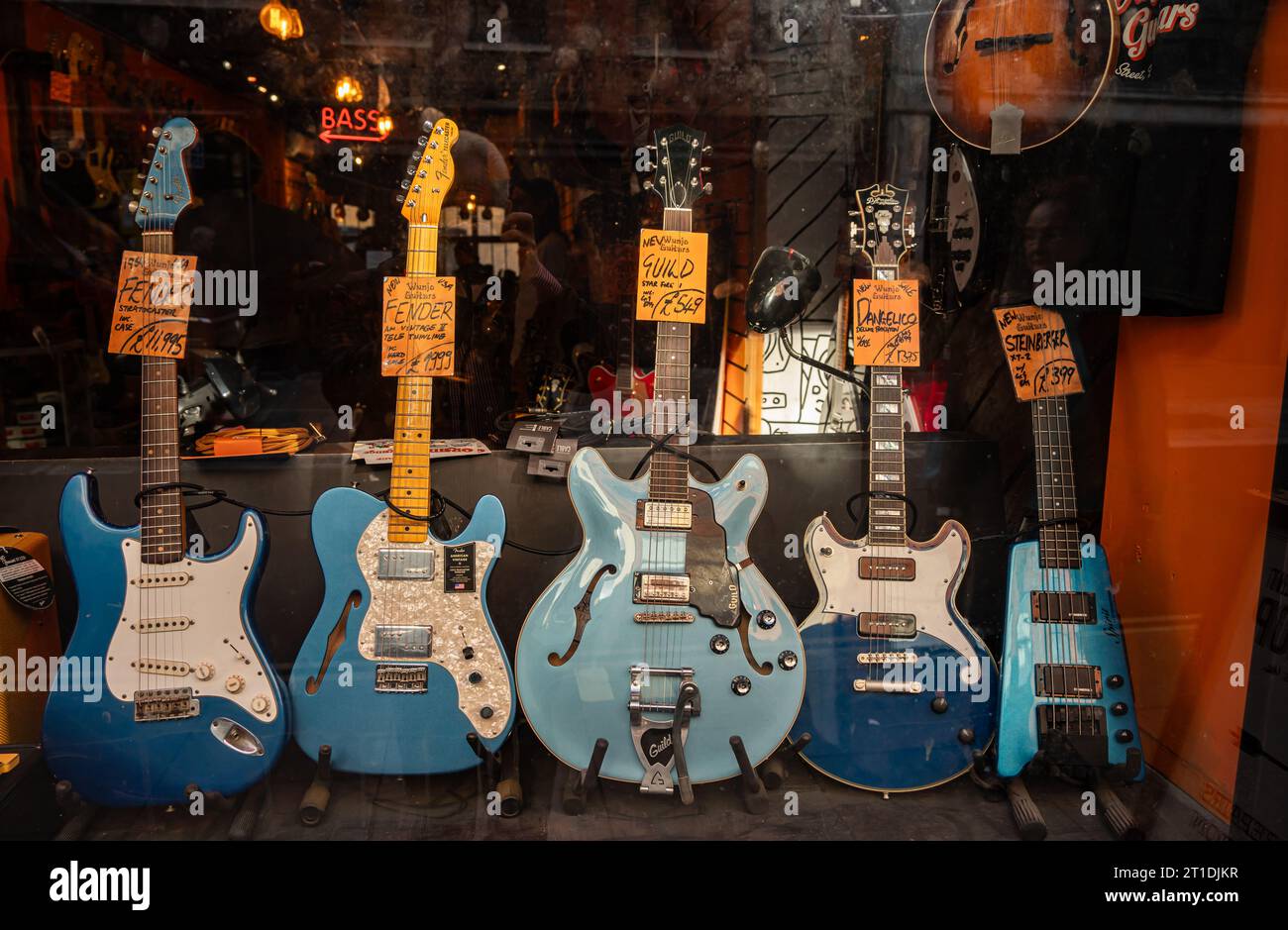Upscale guitar shops on Denmark Street in London offering guitars and repair services. Run by