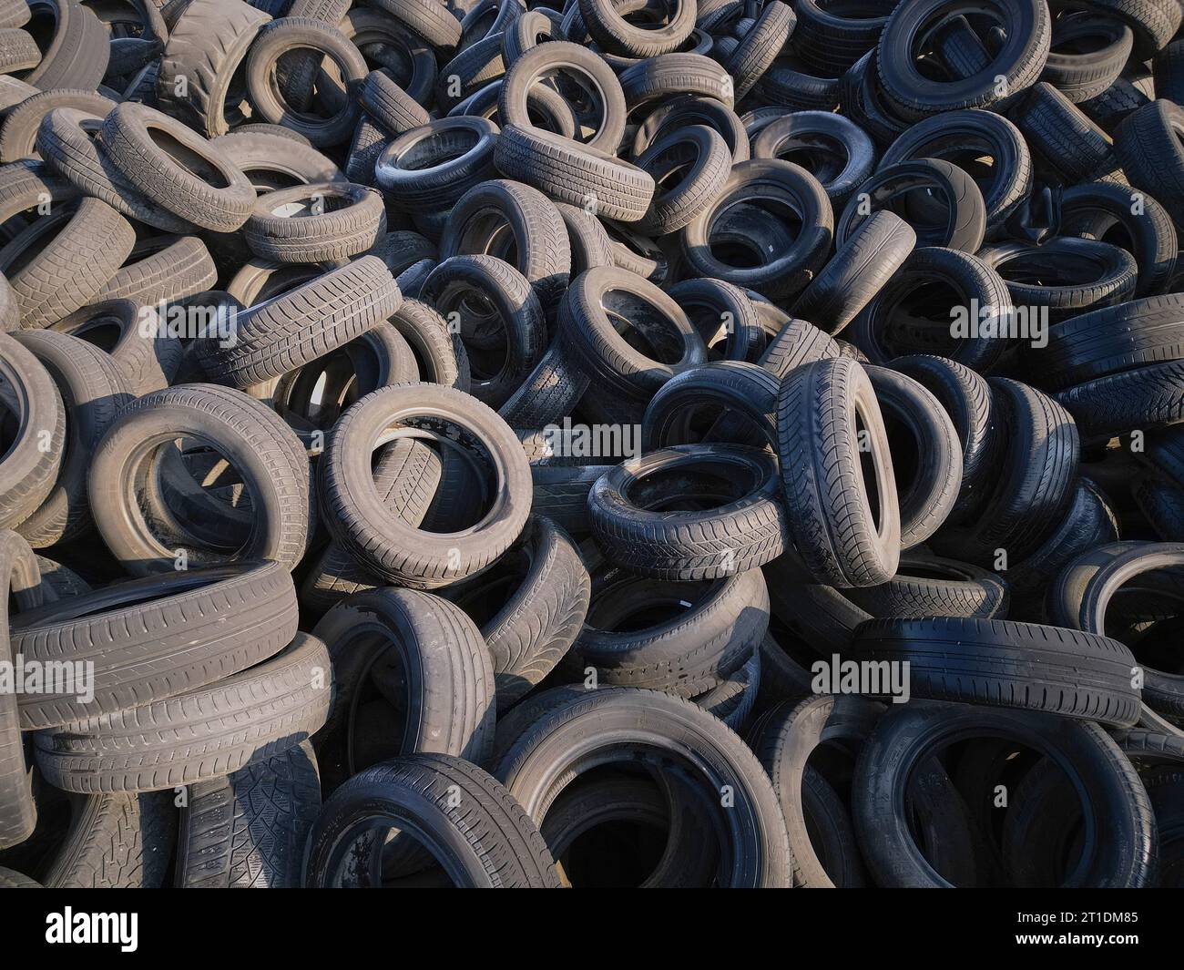 Aerial top down view of old tires. Many car and truck tires on dump