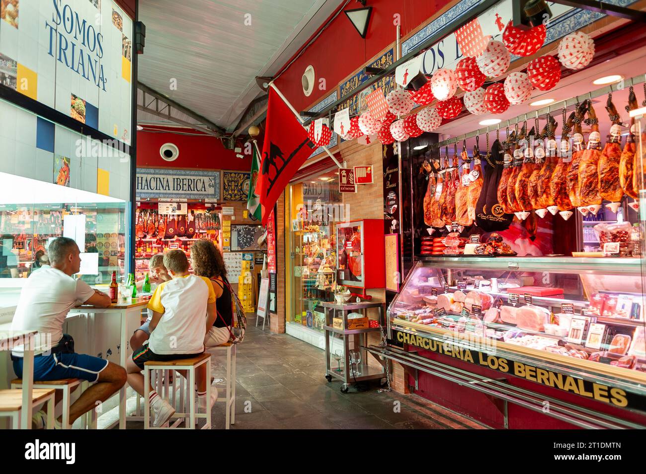 Seville, Spain, People Shopping, inside Covered Public Spanish Food Market, 'Mercado De Triana' Stock Photo