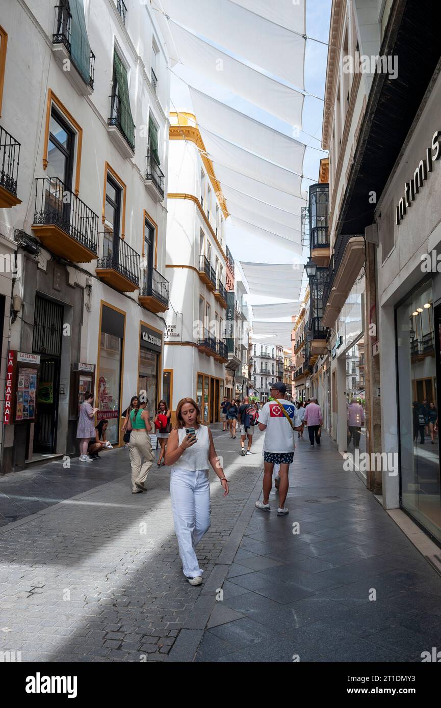 Seville, Spain, Crowd of People, Tourists, Visiting Old City 'Santa Cruz' Neighborhood Stock Photo