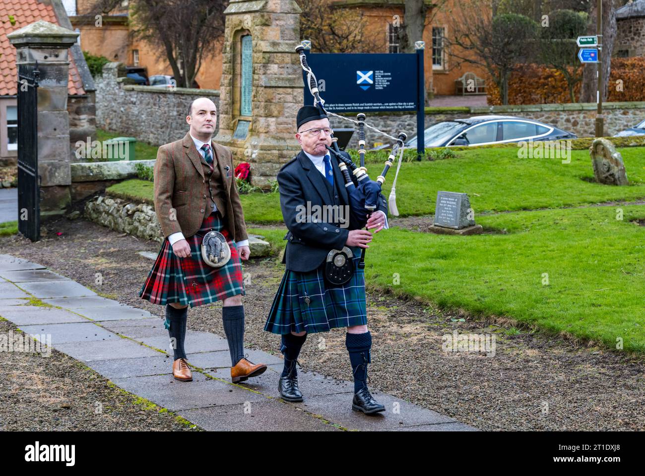 Fraser Thompson, Scottish Flag Trust led by piper, St Andrew's Day, Athelstaneford, East Lothian, Scotland, UK Stock Photo