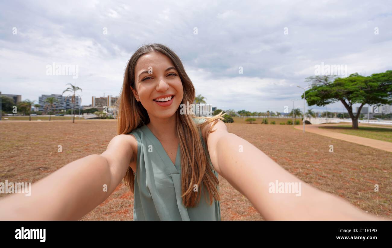 Beautiful Brazilian girl takes self portrait in Brasilia, Brazil Stock Photo