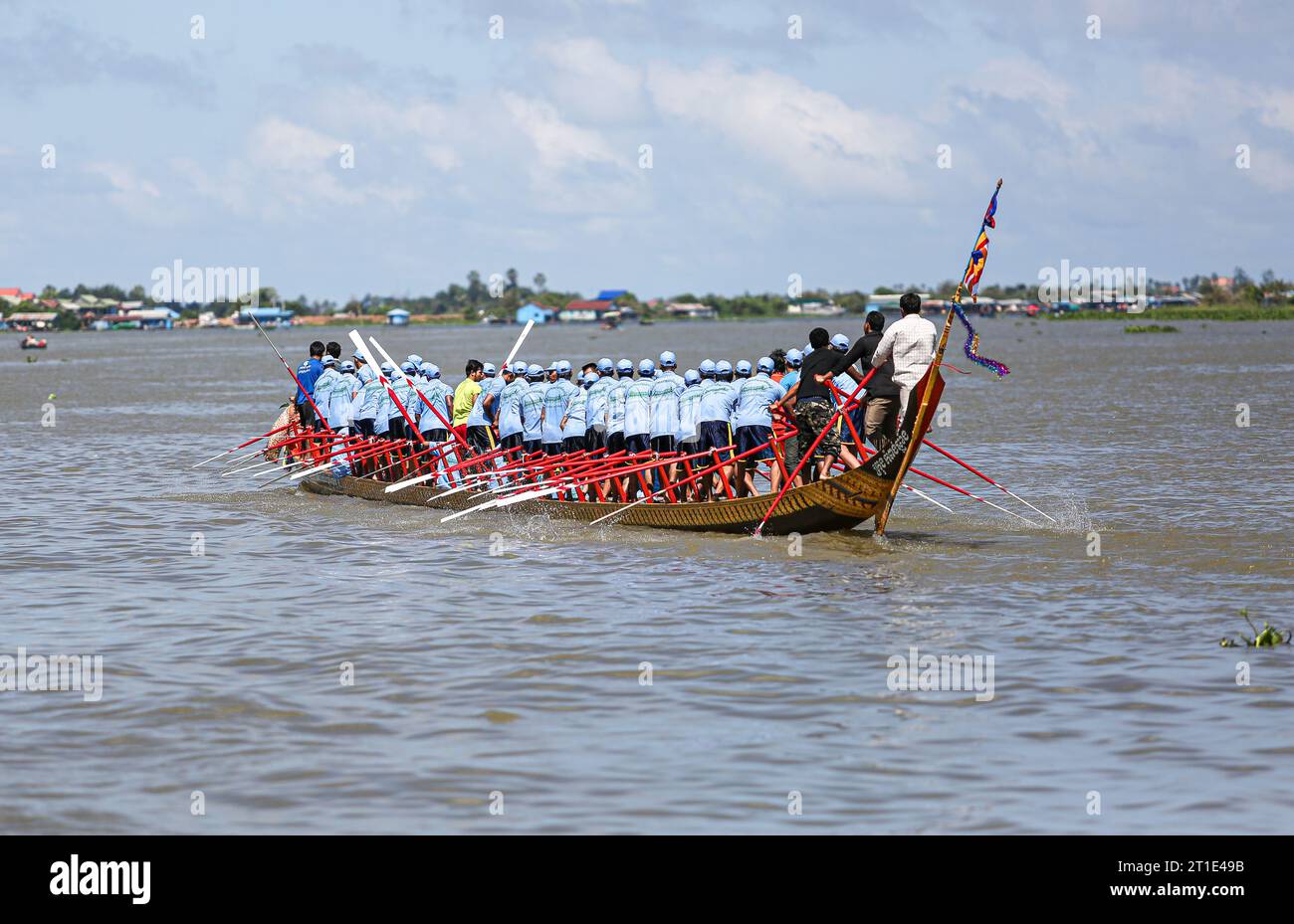 Kampong Chhnang, Cambodia. October 13, 2023 : Racing boat training in preparation for the Bon Om Touk Water Festival races (November 26-28) and Pursat River regatta (November 4-6). Boat crews were urged by officials to train hard as this traditional Khmer celebration return to Phnom Penh after being canceled for three consecutive years. The event honors the occasion of the Tonle Sap River reversing its flow, a unique event that attracts millions people, locals and tourists. Today, Cambodian people start a 3 days public holiday for Pchum Ben Ancestor's Day. Credit: Kevin Izorce/Alamy Live News Stock Photo