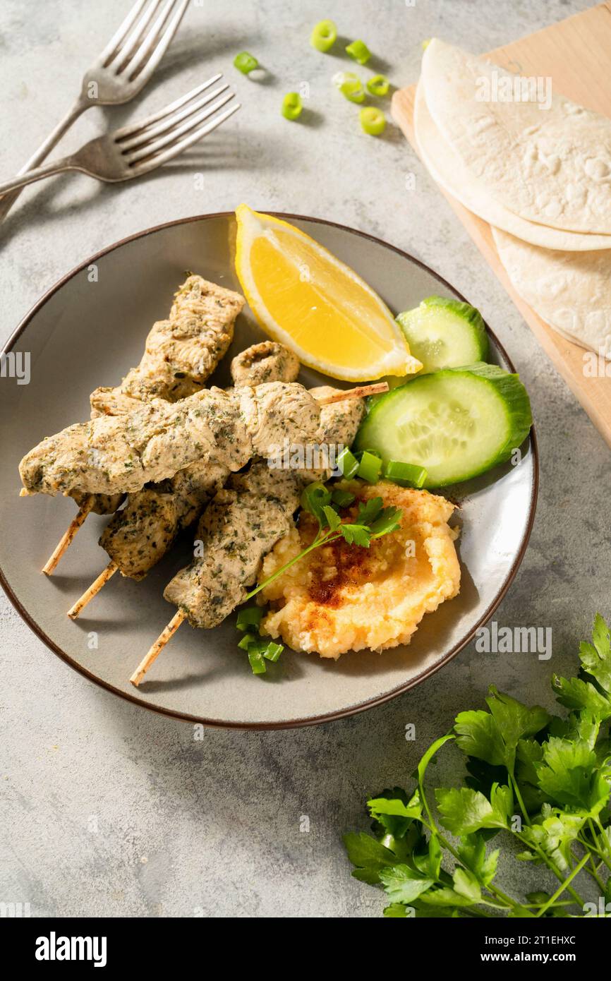 Marinated chicken skewers with mashed potatoes Stock Photo