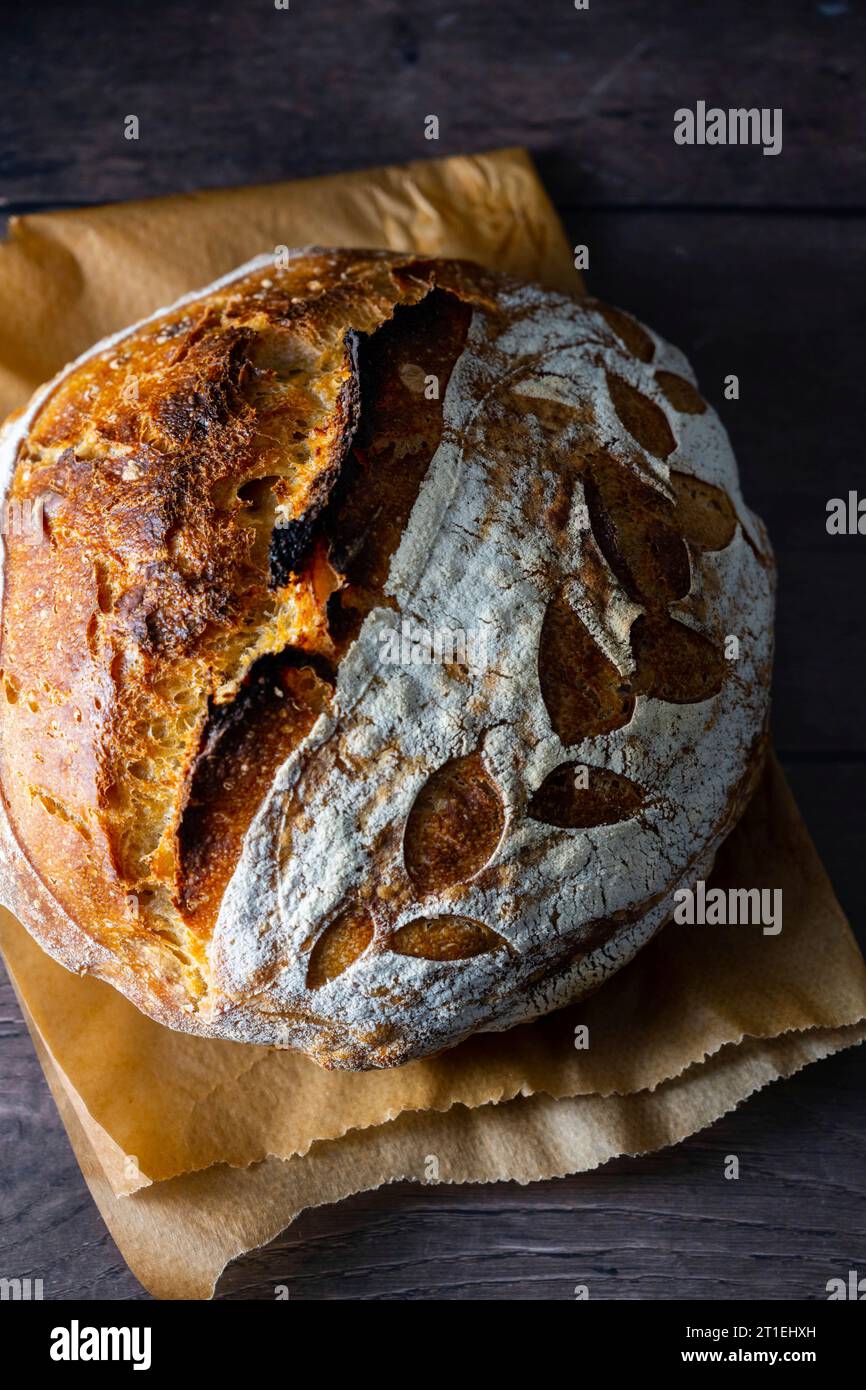 Homemade sourdough bread with decorative scoring Stock Photo - Alamy