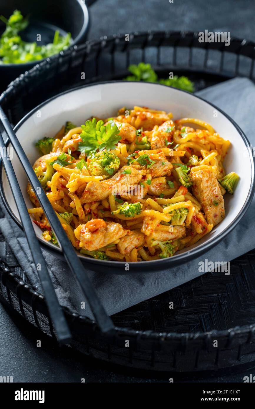 Spicy chicken noodle dish Stock Photo - Alamy