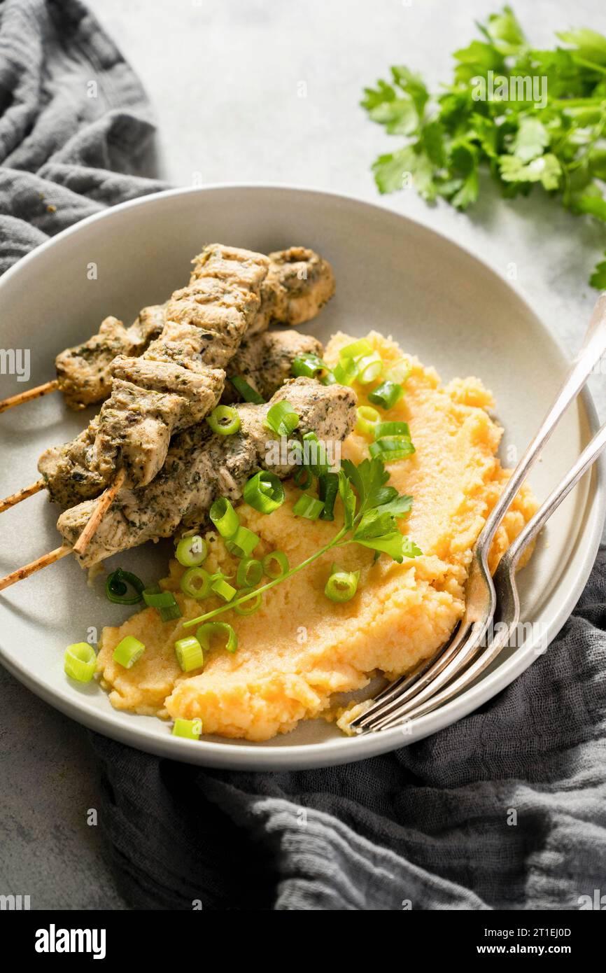 Marinated chicken skewers with mashed potatoes Stock Photo