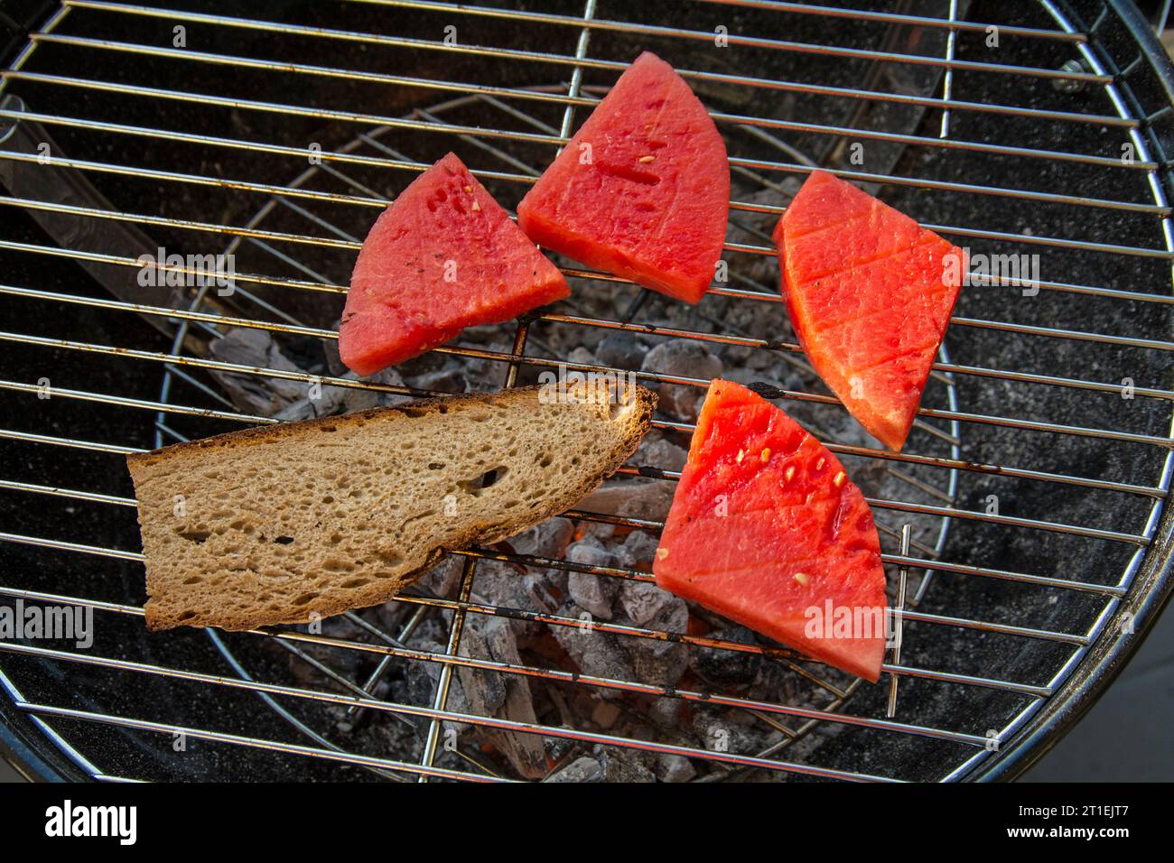 Bread and watermelon on the grill Stock Photo