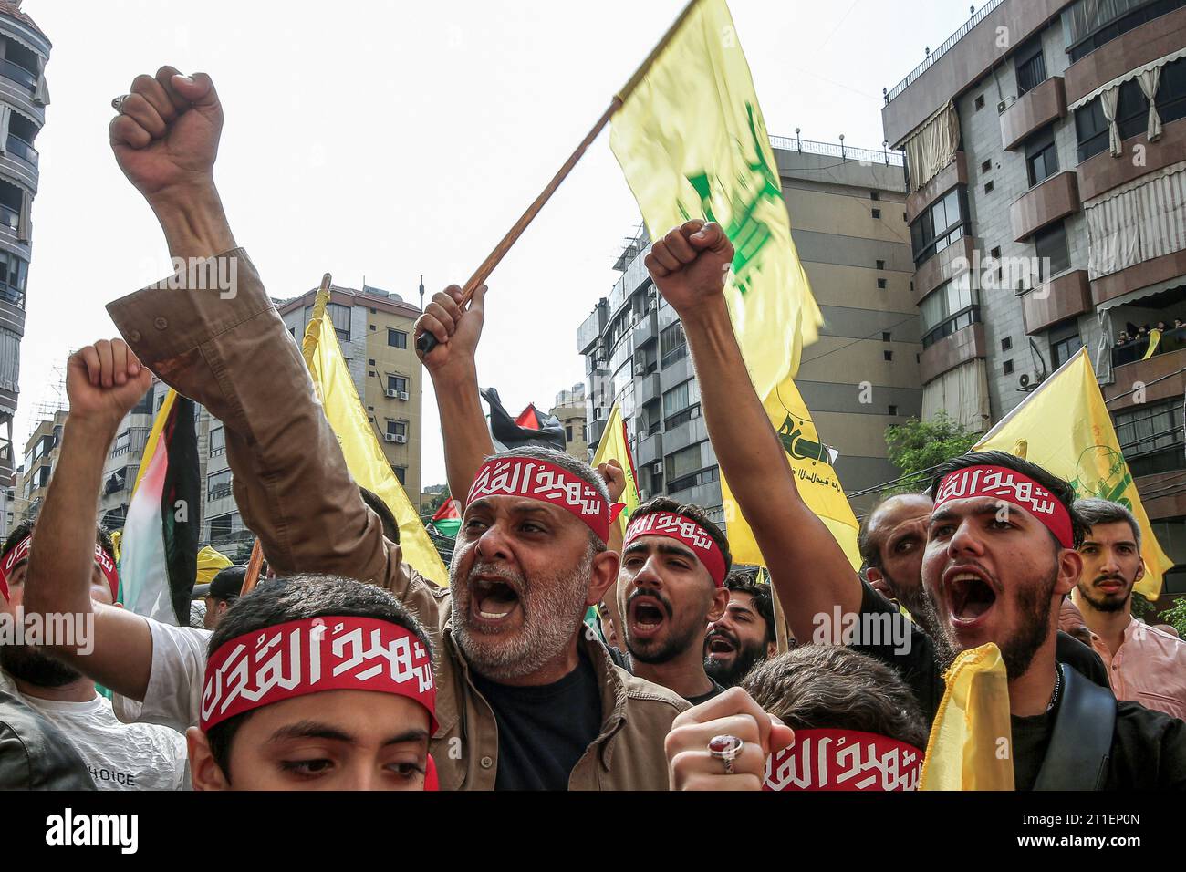 Beirut, Lebanon. 13th Oct, 2023. Lebanese protesters carry Hezbollah