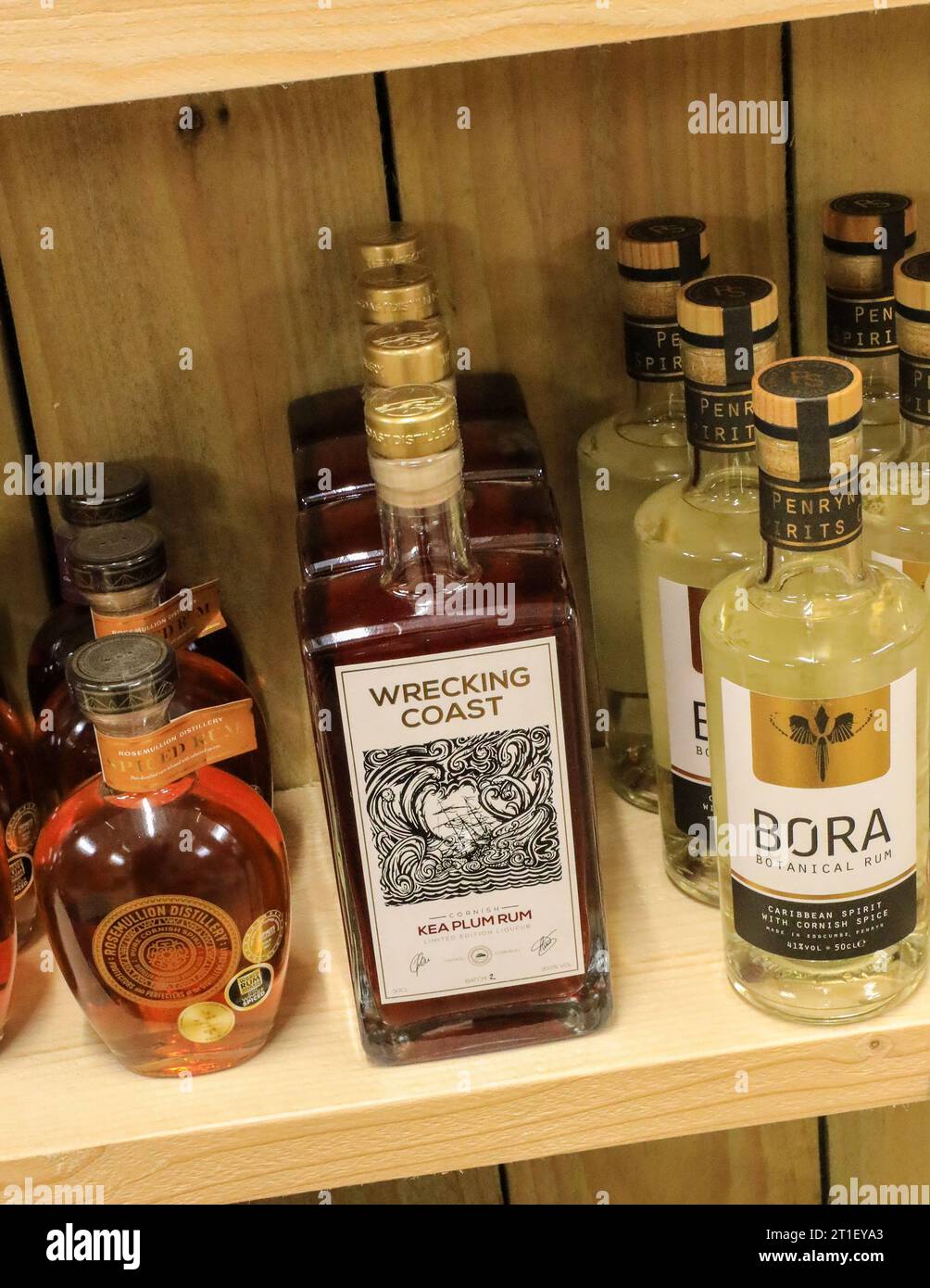 Bottles of Rum for sale in the shop at the Lost Gardens of Heligan Cornwall April 2021 Stock Photo