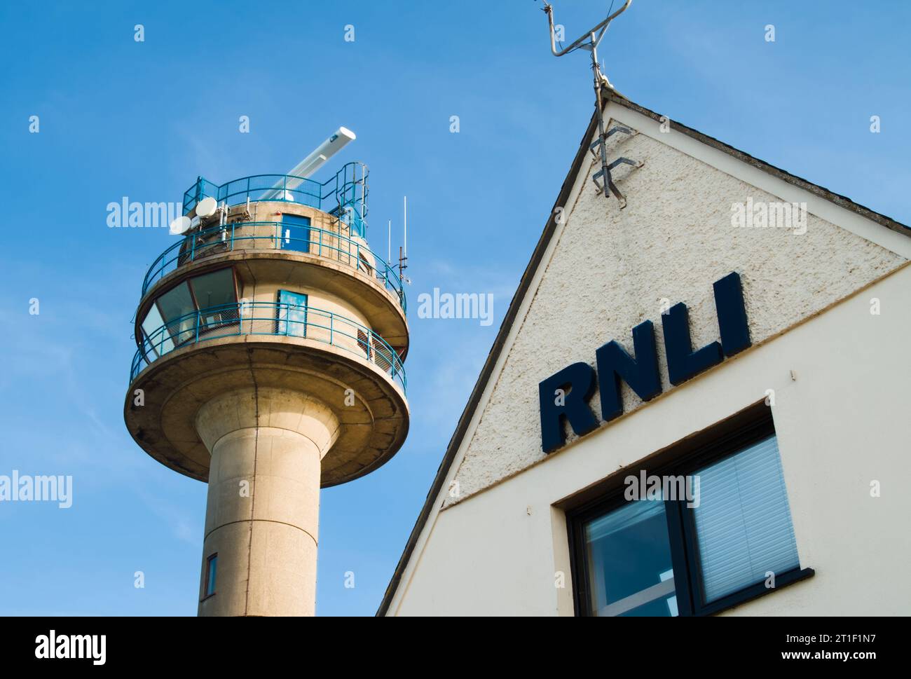 RNLI Lifeboat Station With The NCI Coastguard Concrete Watch Tower On Calshot Spit, UK Stock Photo