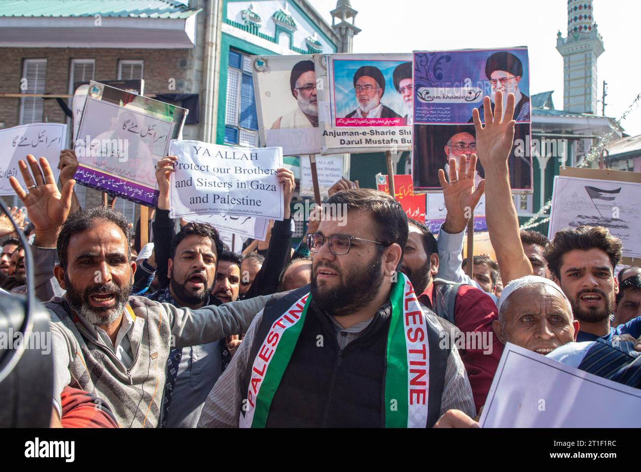 Kashmiri Muslims hold placards while chanting slogans during a ...