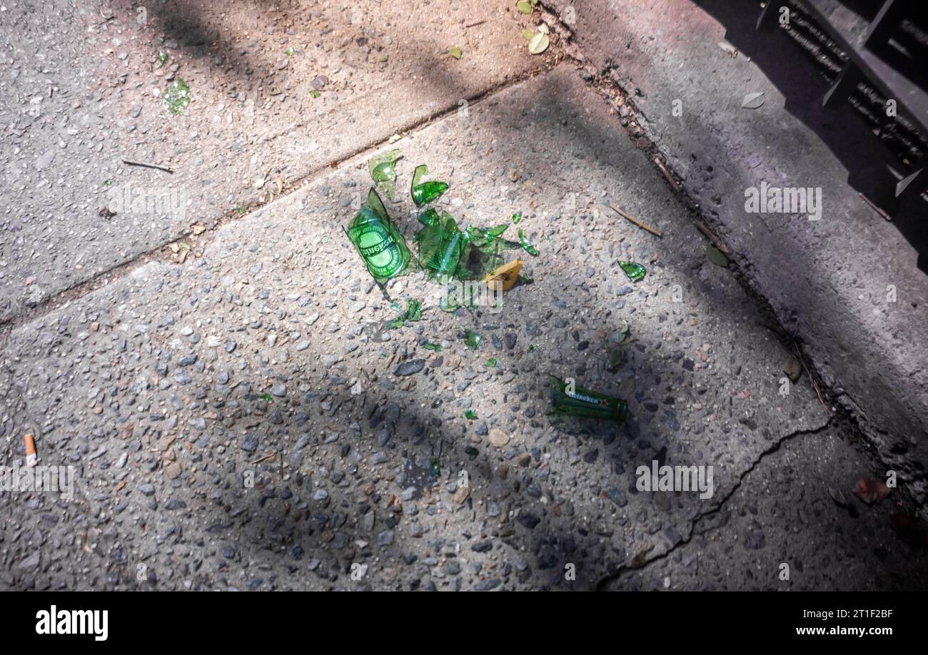 A broken bottle of Heineken beer in the Chelsea neighborhood of New ...