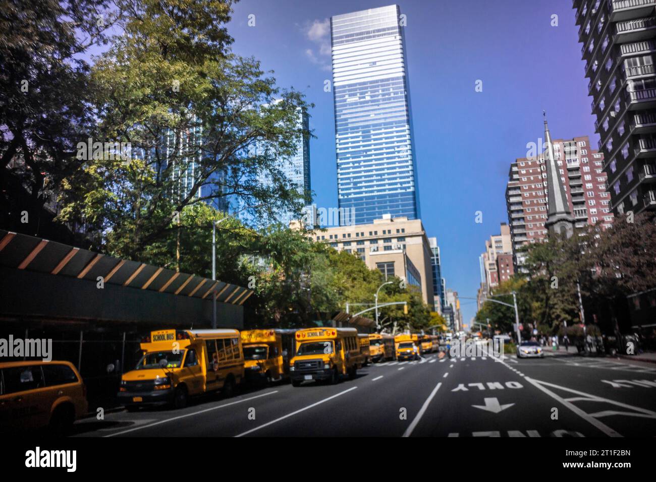 School buses park in front of PS33 in Chelsea awaiting dismissal. in New York on Thursday, October 5, 2023. (© Richard B. Levine) Stock Photo