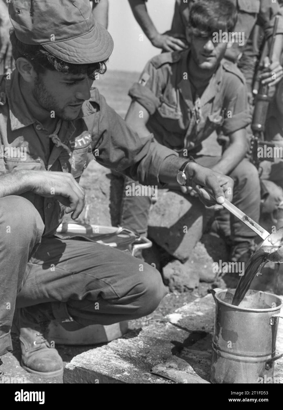 YOM KIPPUR WAR.  IN THE PHOTO, IDF SOLDIERS       PREPARING COFFEE. IDF photograph by Karen Zvi Stock Photo