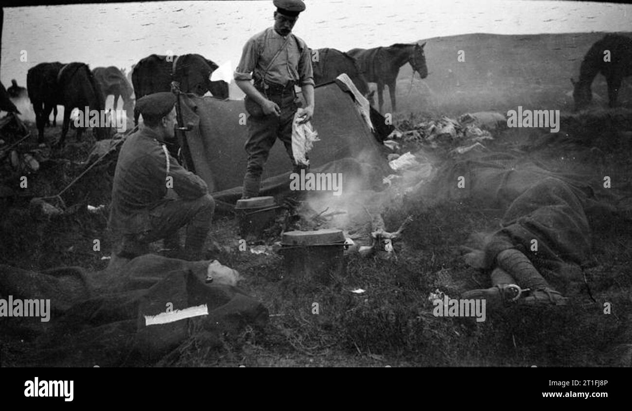 The British Army in Pre-1914 Period Troops of one of the Scottish mounted regiments resting in their camp. They are probably servicemen of the Lothians and Berwickshire Yeomanry. Stock Photo