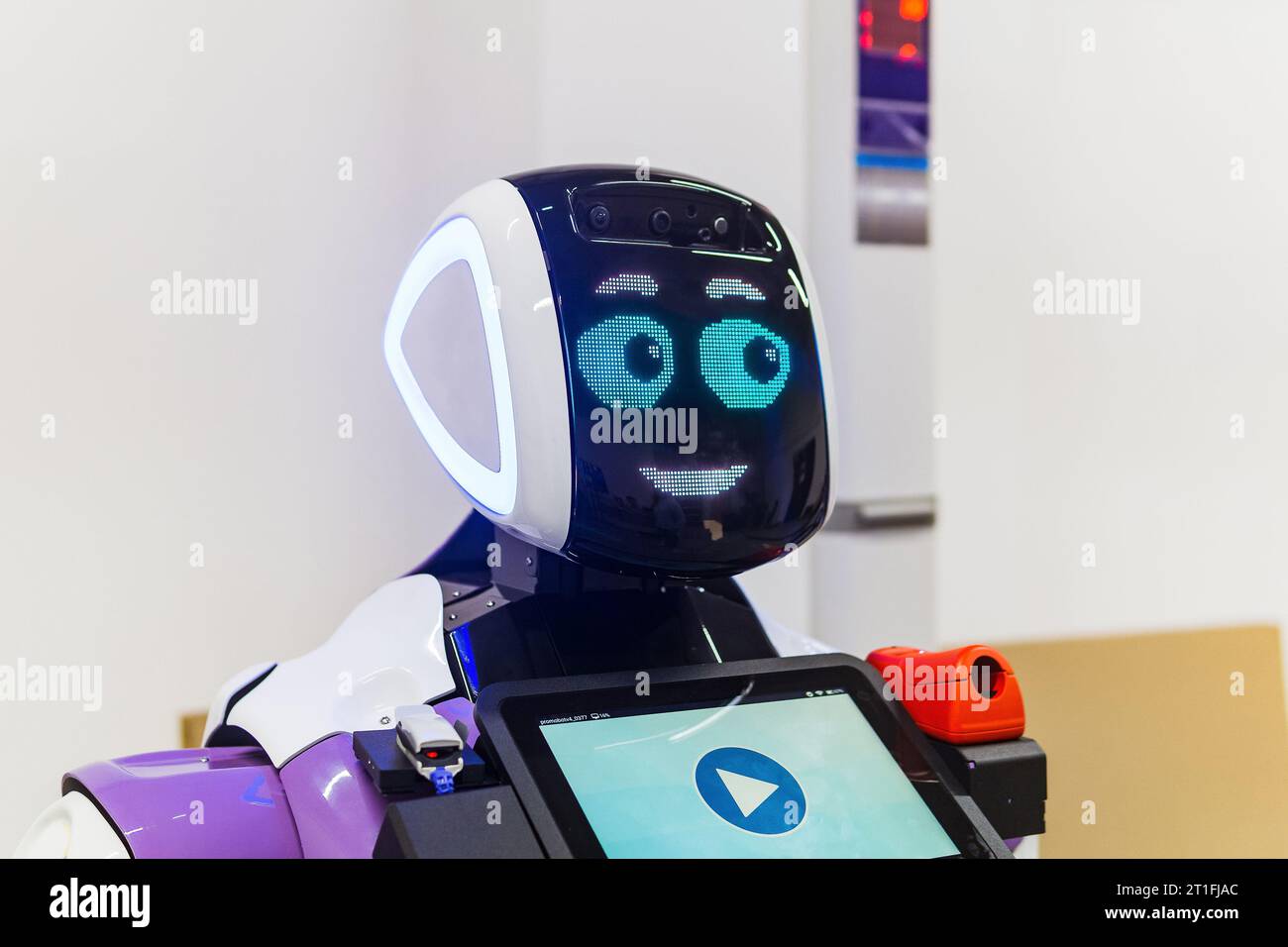 Perm, Russia - July 13, 2023: friendly humanoid robot guide expressing ...