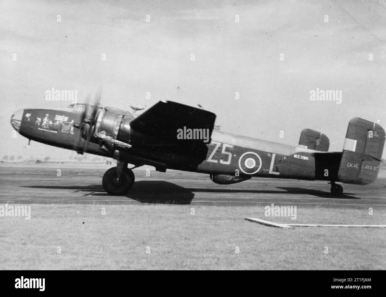 Aircraft of the Royal Air Force 1939-1945- Handley Page Hp.57 Halifax. Halifax B Mark III, MZ296 ?Z5-L?, of No 462 Squadron RAAF, about to take off from Driffield, Yorkshire, on the crew?s last operation of their tour, (note the chalked message on the tail fin). The aircraft was lost near Brussels the following month while flown by a different crew. Stock Photo