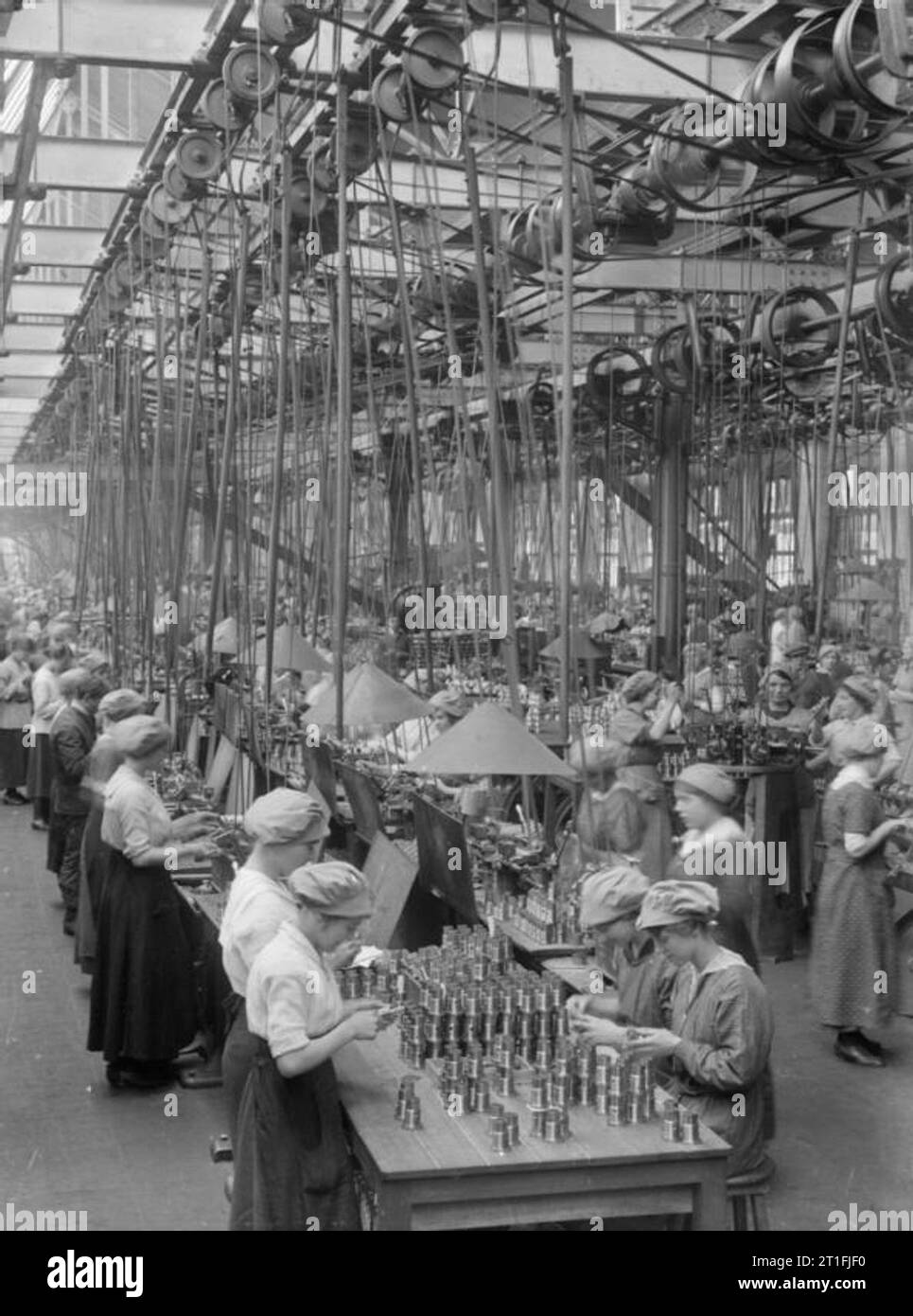 Industry during the First World War- Coventry Female workers operating fuze head machines in the Coventry Ordnance Works during the First World War. Stock Photo