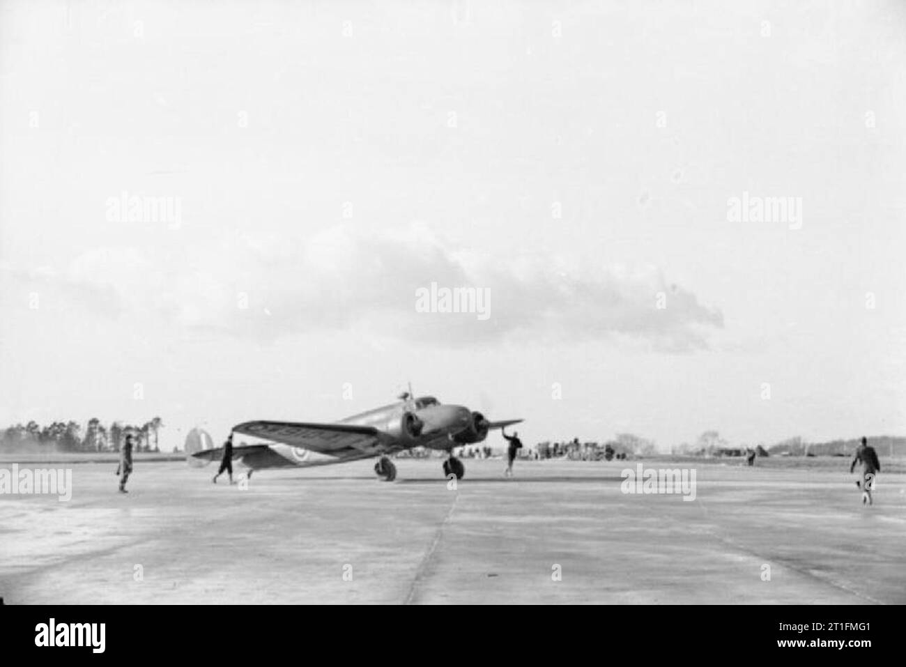 American Aircraft in RAF Service 1939-1945- Lockheed Model 10a Electra. Electra, W9104, of No. 24 Squadron RAF, taxying on an airfield in the United Kingdom. Formerly G-AFEB of British Airways Ltd, this aircraft was impressed into the RAF and delivered to No. 24 Squadron on 18 December 1939. It was struck off charge after a landing accident at Clifton, Yorkshire, on 12 October 1941. Stock Photo
