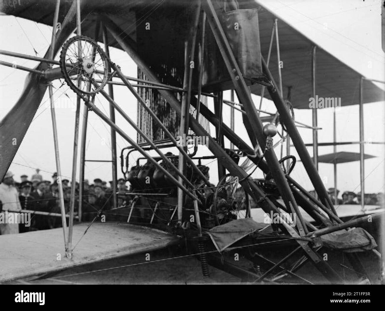 Aviation in Britain Before the First World War A good close up of the ENV engine mounted on the Cody aircraft mark IC (Cathedral - so named because of its size and the size of the hangar it required and the katahedral (lower at the wing tips) arrangement of the wings). Note the chain drive for the propellers. The most important change made with this mark was moving the pilots seat to in front of the engine. The aircraft was altered several more times, here balancing planes have been added between the wings on the rear outer struts. Particularly with his earlier aircraft Cody made constant adju Stock Photo