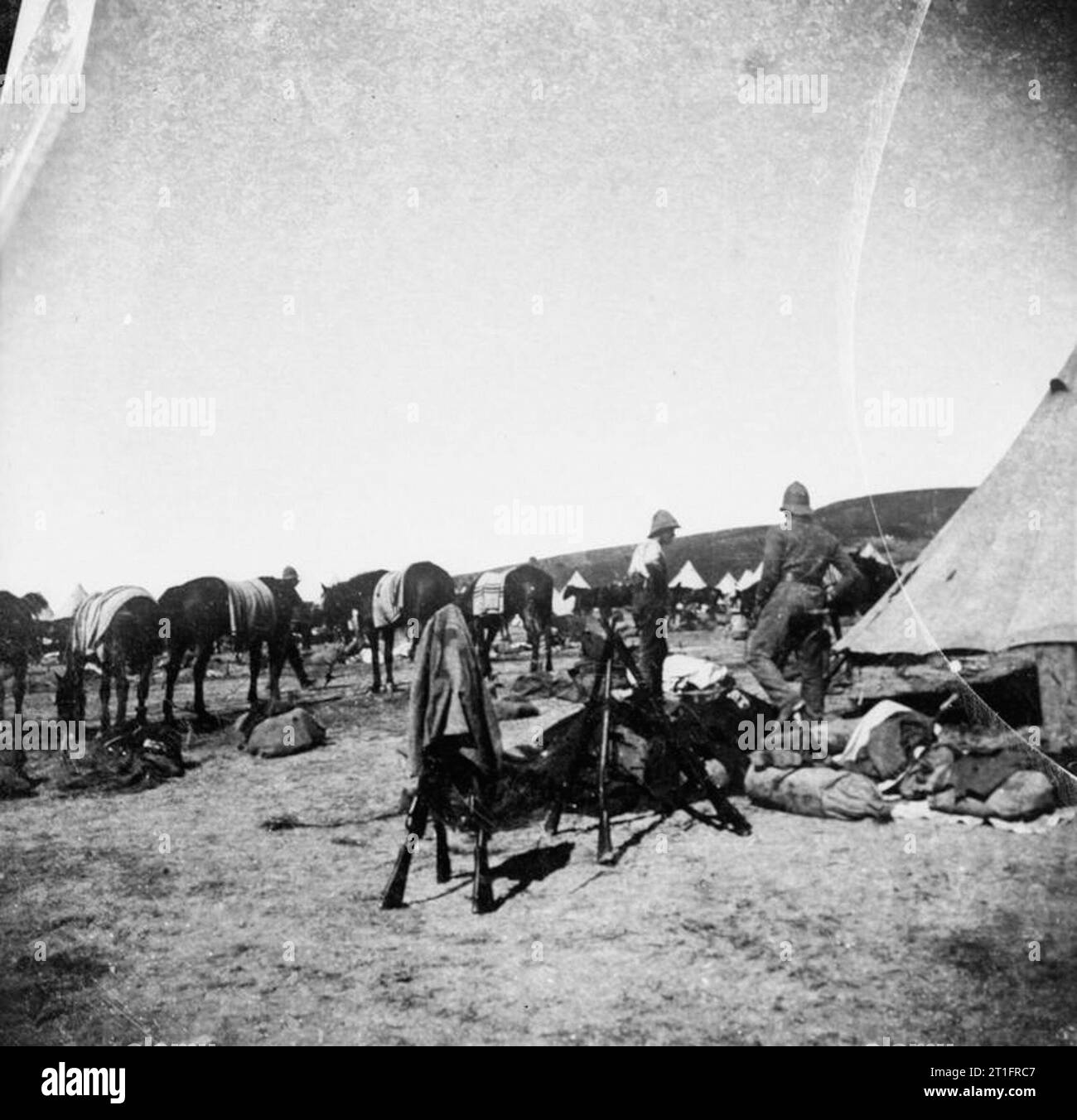 The Second Boer War, 1899-1902 Soldiers of one of the British mounted regiments (mounted infantry?) resting in their camp. Stock Photo
