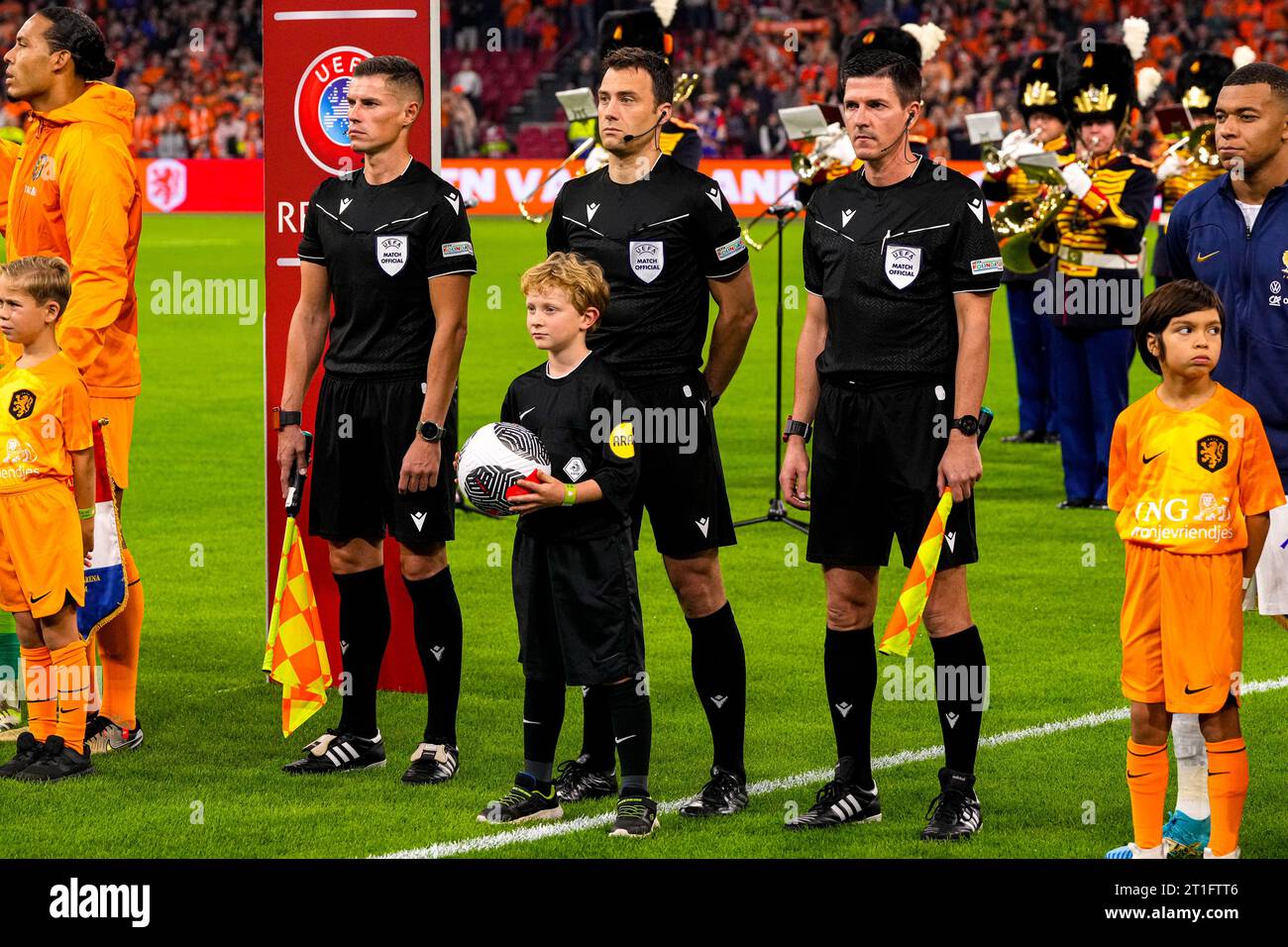 Amsterdam, Netherlands. 13th Oct, 2023. AMSTERDAM, NETHERLANDS - OCTOBER 13: assistant referee Stefan Lupp, referee Felix Zwayer, assistant referee Robert Kempter during the UEFA EURO 2024 Qualifying Round Group B match between Netherlands and France at Johan Cruijff ArenA on October 13, 2023 in Amsterdam, Netherlands (Photo by Patrick Goosen/ Orange Pictures) Credit: Orange Pics BV/Alamy Live News Stock Photo