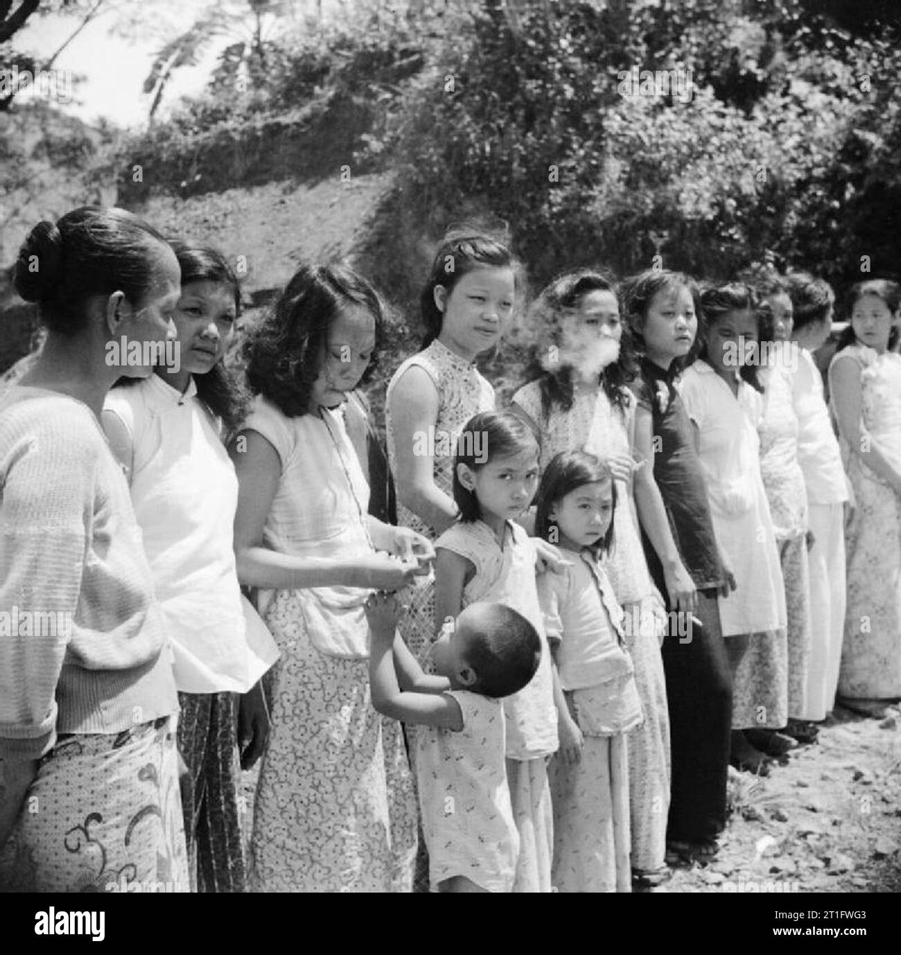 The Allied Reoccupation of the Andaman Islands, 1945 Chinese and Malayan girls forcibly taken from Penang by the Japanese to work as 'comfort girls' for the troops. Stock Photo