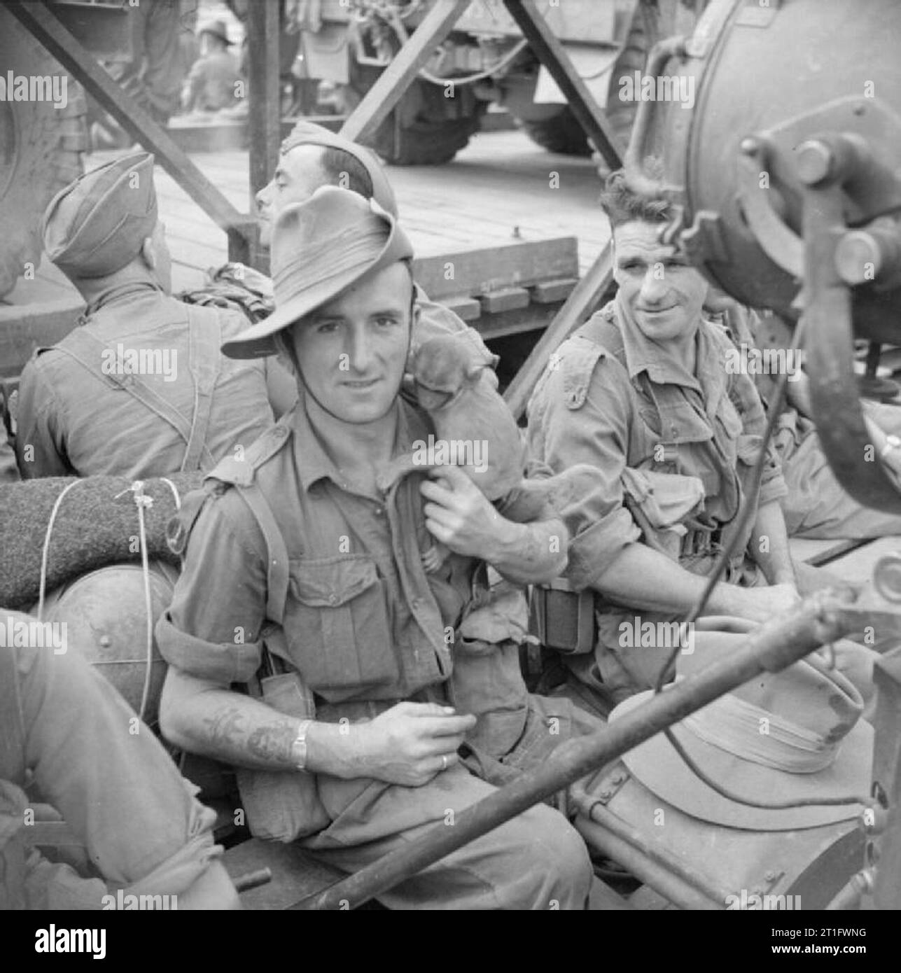 The British Army in Burma 1945 Troops and vehicles on a ferry crossing