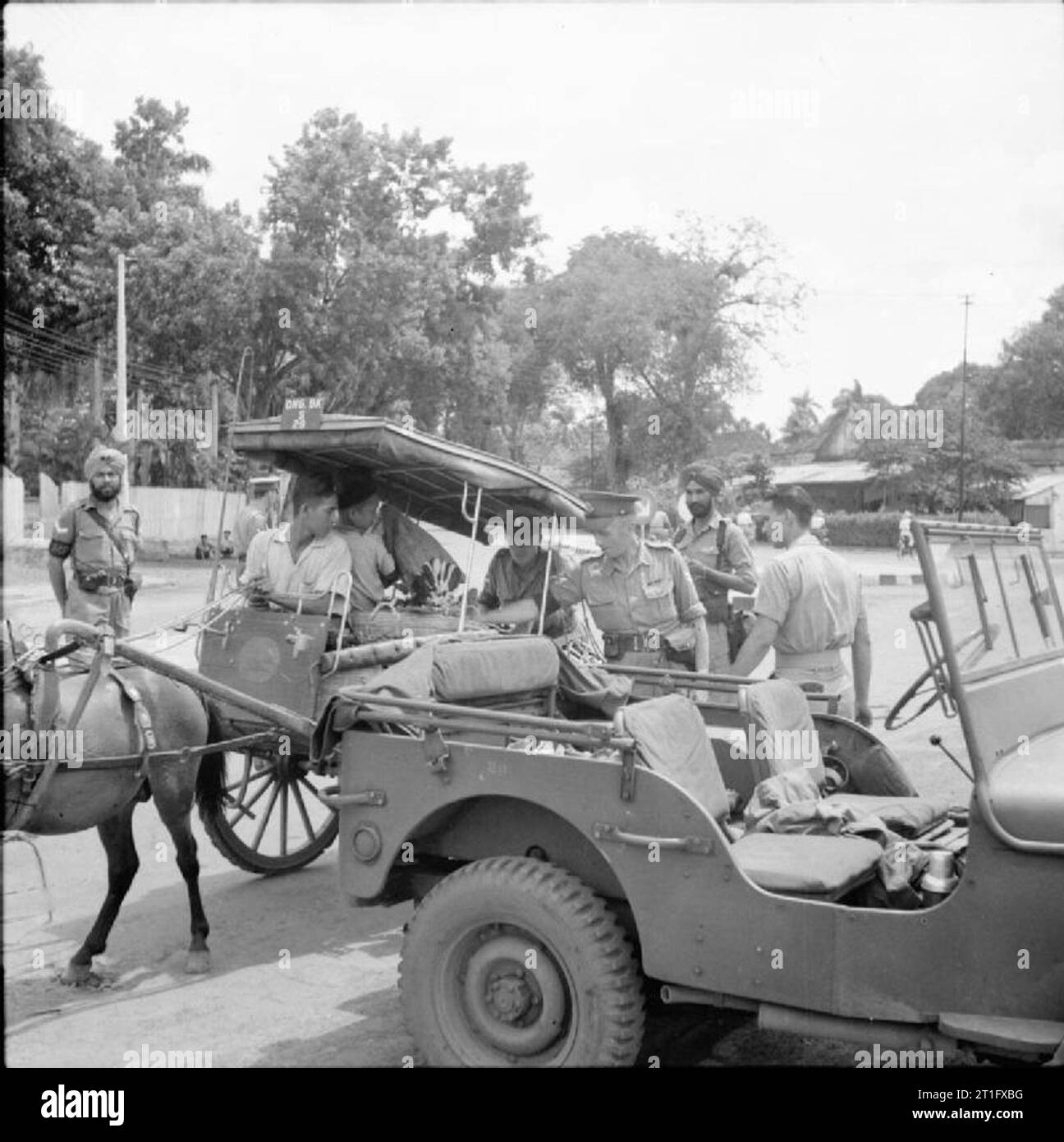 Java Invasion Newspaper The British Occupation of Java British military policemen search an ...