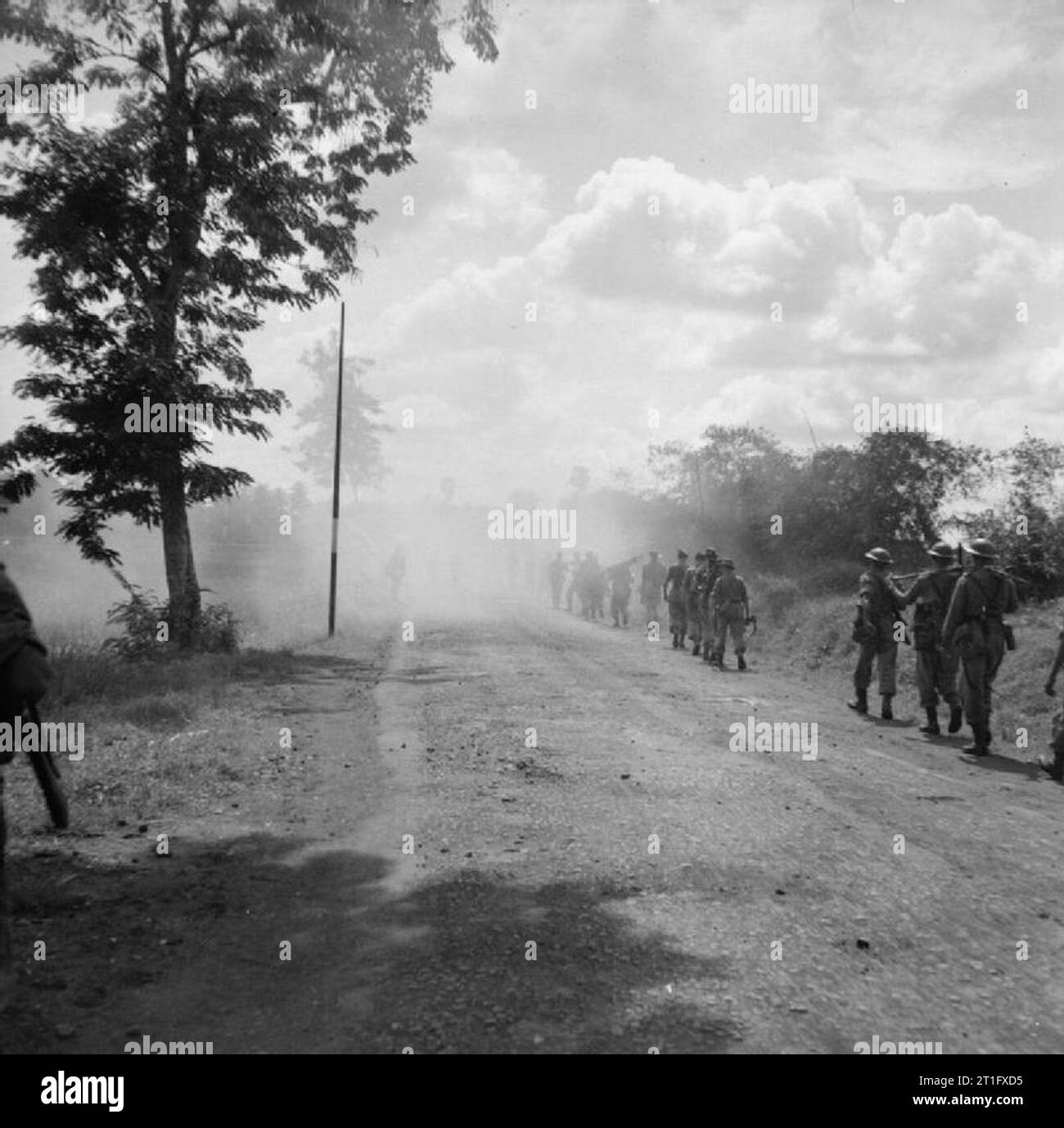 The British Occupation of Java Men of the 4/7th Rajputs advance towards Bekassi during a reconnaissance in force against suspected Indonesian nationalist positions. They were supported by Sherman tanks of the 13th Lancers and could call upon artillery support from 336 Field Artillery. Stock Photo
